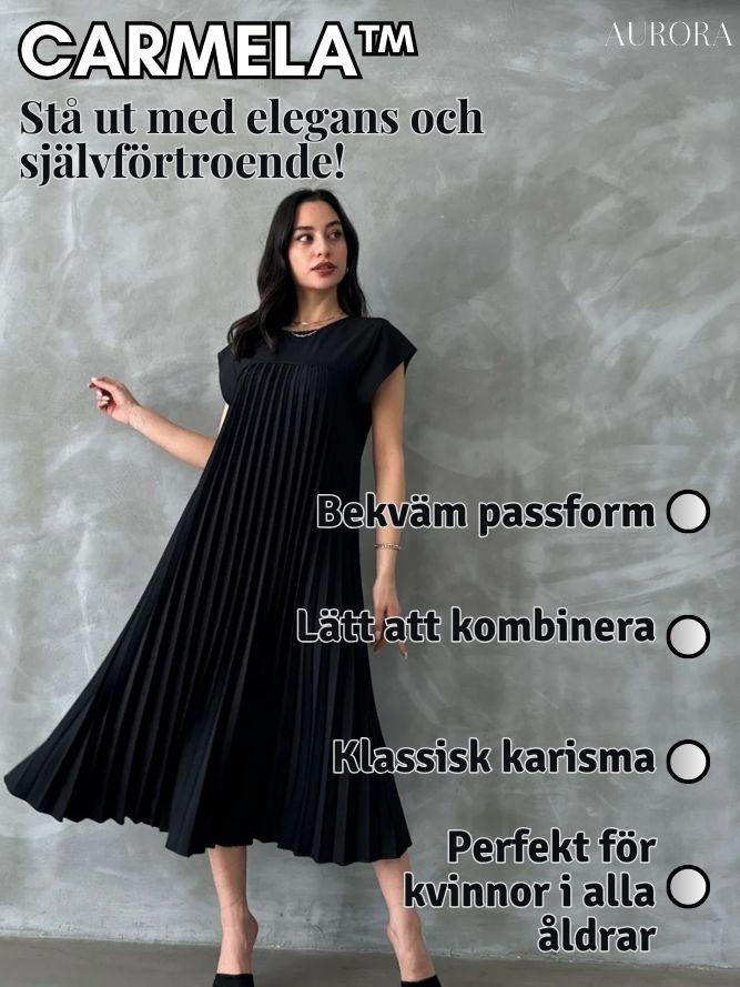 TILLFÄLLIGT 50% RABATT | Carmela™ | Ärmlös, plisserad, enfärgad klänning